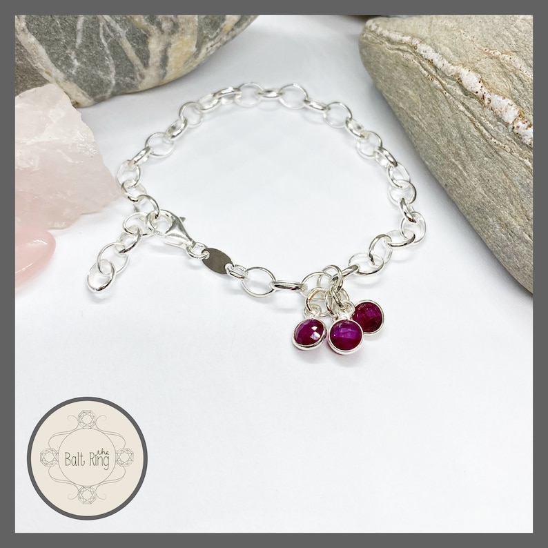 Sterling Silver bracelet with Ruby charms