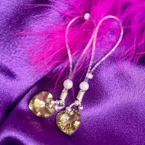 Sex toys for couples. Nipple jewellery for bedroom fun. Sexy nipple clamps. Mature.