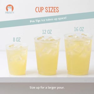 three different sizes of plastic cups filled with a yellow liquid, likely lemonade or iced tea, with ice cubes.