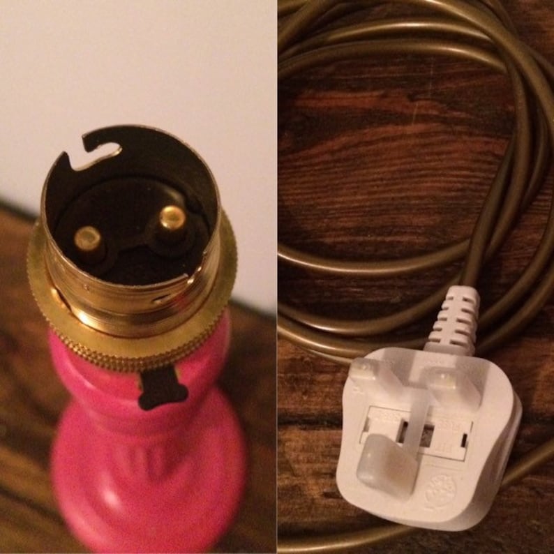 May include: A pink lamp base with a gold metal light socket and a white electrical cord with a three-prong plug.
