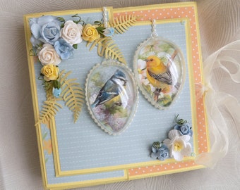 Scrapbooking box, Easter birds, candles, and ribbon, handmade crafts