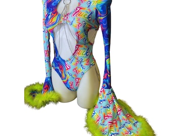May include: A blue, rainbow, and white bodysuit with long sleeves and a chain detail. The bodysuit has the word "F**K" printed all over it. The sleeves have green feather trim.