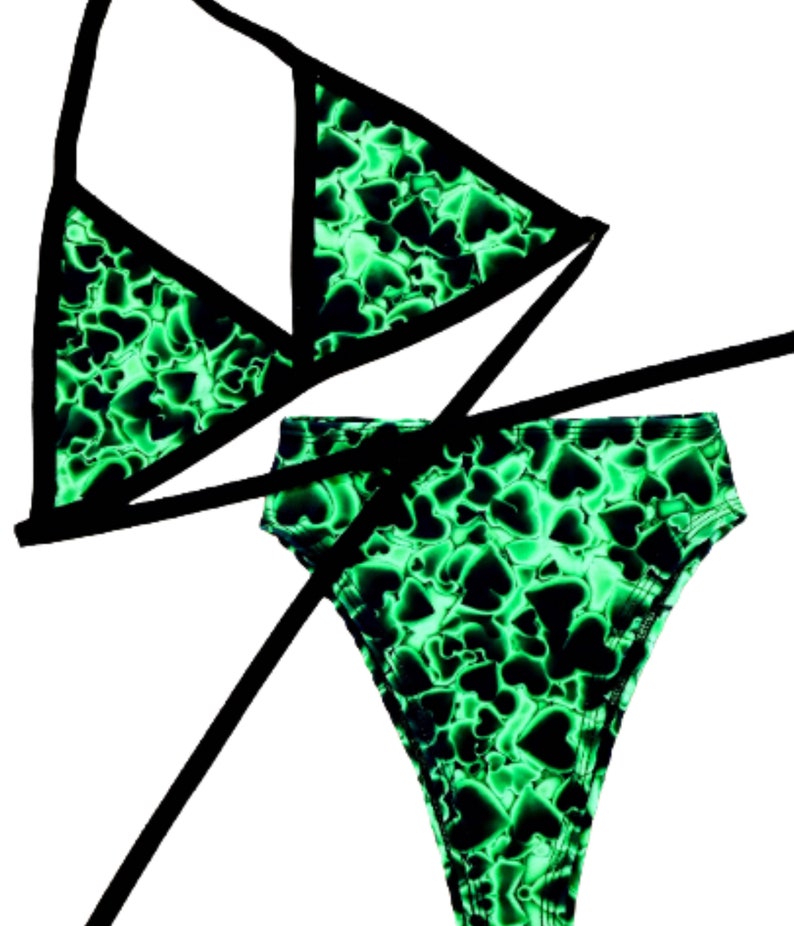 May include: A black and green bikini with a heart print. The top is a triangle style and the bottom is a high-waisted style.