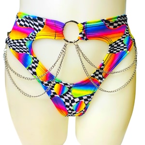 May include: A colorful, rainbow and checkered print,  underwear with a silver chain attached to a metal ring.
