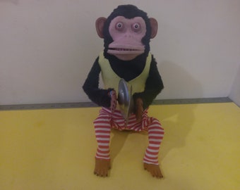 vintage clapping monkey