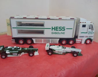 Vintage Toy Vehicles, Hess Vehicles, Dump Truck, Hess Formula One Truck/Cars, Helicopter Truck, 4 X 4, and Hess Truck with Fighter Jet