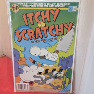 May include: Itchy & Scratchy Comics issue number 3, part 1 of When Bongos Collide crossover with Bart Simpson. The cover features a blue mouse holding a large cleaver over a grey cat against a yellow building background with a blue spotlight.