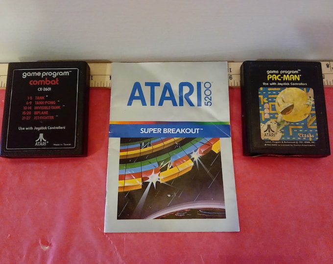 Vintage Gaming Consoles Games, Atari Pac-Man and Combat Games with a Super Breakout Game Book, 1980's~
