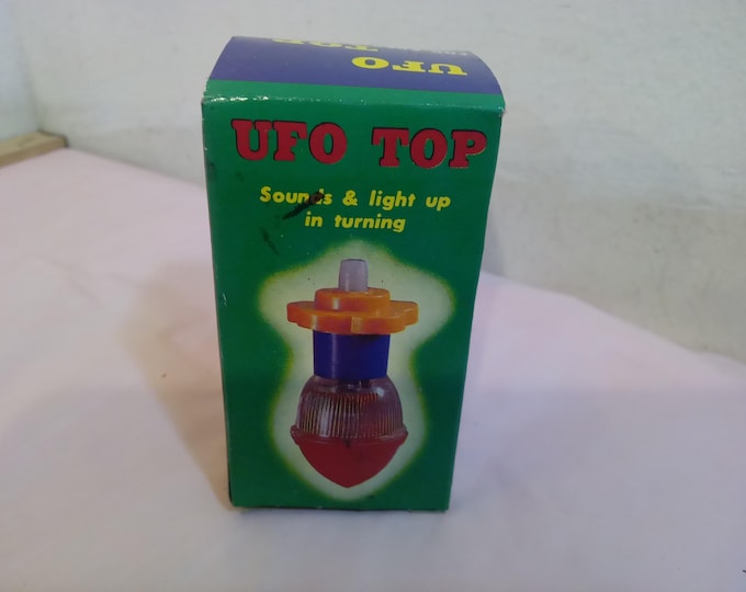 Vintage Plastic Top Toy, UFO Top Makes Sounds and Lights Up when Turning, Made in Taiwan