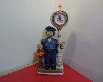 Vintage Clown Porcelain Figurine Musical Clock, Clown Policeman with Child and Lamppost Clock by Melody in Motion, 1980's