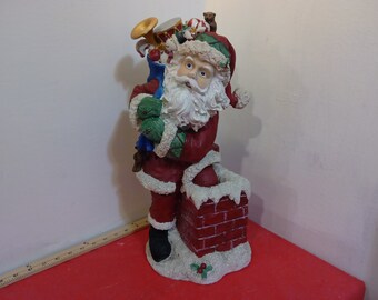 Vintage Christmas Decoration, Resin Santa with Toy Bag and Stepping into a Chimney