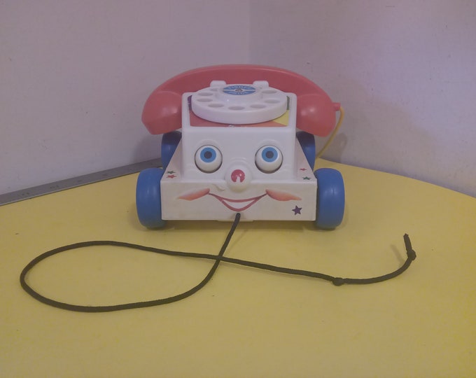 Pull Toy "Chatter Phone" with Rolling Eyes made by Fisher Price
