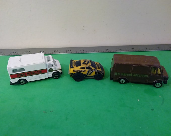 Vintage Die Cast Cars, U.S. Parcel Services, Dewalt Car, and Fire Rescue vehicle, 1990's