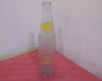 Vintage Soda Bottles, Tab Bottle 10 oz, Carroll-Line-A 12 oz, Circle A Brand 10 Oz, Ingles Coke w/cap 10 oz, and Fanta 10 oz, 1970's