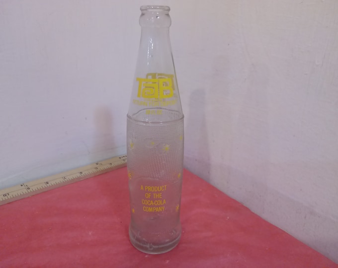 Vintage Soda Bottles, Tab Bottle 10 oz, Carroll-Line-A 12 oz, Circle A Brand 10 Oz, Ingles Coke w/cap 10 oz, and Fanta 10 oz, 1970's