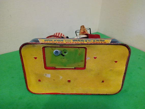 Vintage Tin Toy, Mr. Fox the Magician Blowing Magical Vintage Tin Toy, Mr. Fox the Magician Blowing Magical