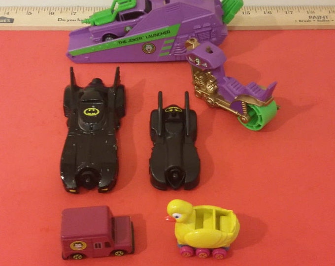 Batman Vehicles from different years.