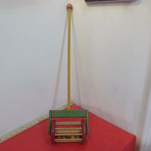 Brinquedo de rolo de bola de impulso vintage, brinquedo de impulso de rolo de bola de madeira Playskool #