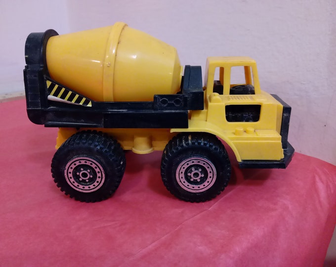 Vintage Plastic Toy Vehicles, Plastic Tootsie Toys, Cement Mixer, Dump truck, Grader, 4-Wheel Truck, and a Ladd Dump Truck