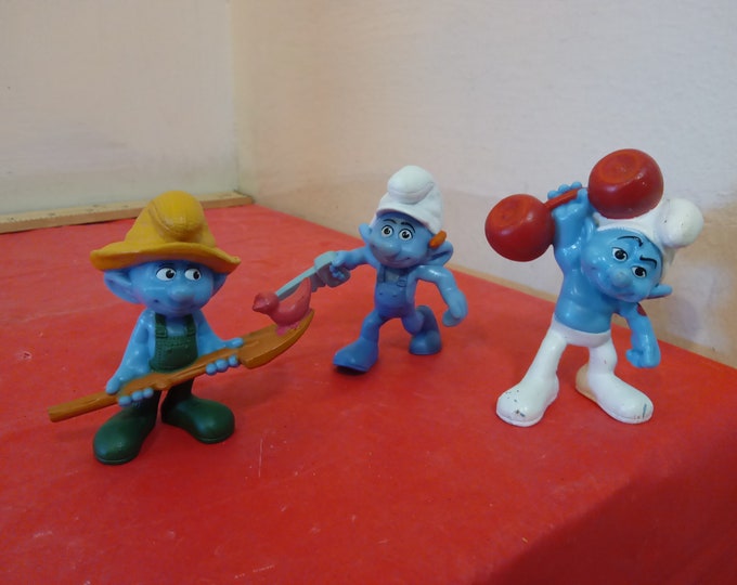 Vintage Smurf Figurines, Farmer, Handy, and Hefty from McDonald's Happy Meals. 2011