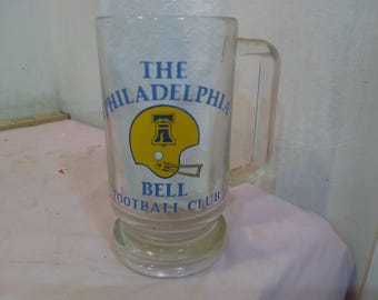 Vintage Football Glasses, Dallas Cowboys Coffee Cup, Jets, Buffalo Bills, The Philadelphia Bell, Cornhuskers, Plymouth Chargers/Chuck Noll#