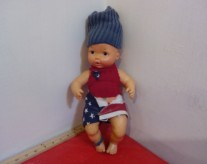 Vintage Rubber Doll, Rubber Boy Doll with Flag Diaper, Red Top and Blue Head Covering by Lesney, 1975