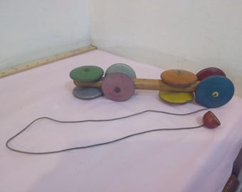 Vintage Wooden Pull Toy, Multi-Colored Wheel Pull Toy by Toy Tinkers Evanston Ill. U.S.A., 1920's