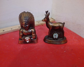 Vintage Souvenirs, Two Bronze Looking Souvenirs with Enameled Symbol from Canada "Chief" and Wyoming "Elk"#