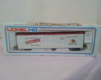 Vintage Train Cars and Switches, Lionel and Bachman HO Scale Train Items, Budweiser, BM, Tropicana, Schlitz, Burlington, and Others