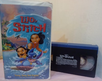 Vintage VHS Movie Tapes, Walt Disney's Movies, Air Bud, Son of Flubber, The Barefoot Executive, Lilo & Stitch, Sleeping Beauty, 1990's