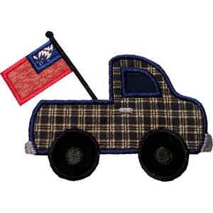 May include: Embroidered truck with a plaid pattern in black, tan, and navy blue. The truck has black wheels and a flag with red and blue accents. The flag is attached to a black pole.