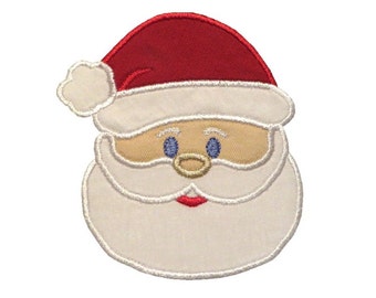 May include: Embroidered Santa Claus face with a red hat, white beard, and rosy cheeks. The design features a cream-colored face, blue eyes, and a red mouth. The Santa Claus face is a festive holiday decoration.