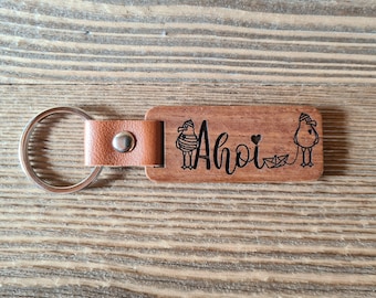 Schlüsselanhänger aus Holz mit "Ahoi" Möwe oder Glücksschweinchen