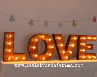 16 inches Light letter. Iluminated Letter. Wood Letter Great for any event :)