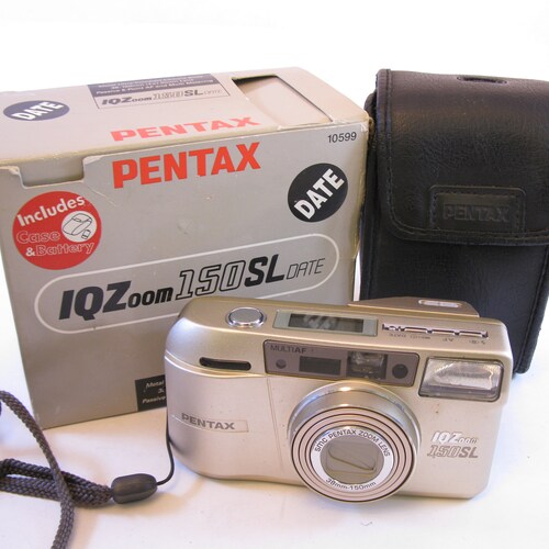 Vintage Pentax IQ Zoom 150SL Date 35mm Ultra Compact shops Point & Shoot Camera with Case, Strap, Manual, in original Box