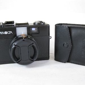 Vintage Minolta Hi-Matic G2 35 mm with Minolta Rokkor 38 mm f1:2.8 Lens with Flash