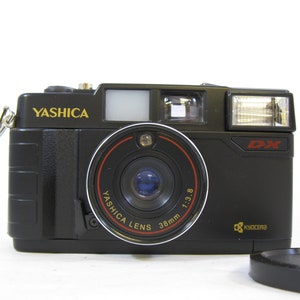 Yashica MF-2 Super DX 35mm Film Camera NEW in Box with Cap, Strap, Case, and Instruction Manual