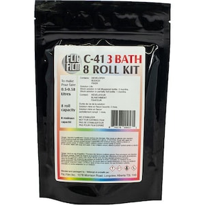 May include: A black resealable bag containing a C-41 3 Bath 8 Roll Kit for developing film. The bag has a label with instructions for use and information about the contents, including the solution life, content, and capacity. The label also states that the product is not a stabilizer and is not for expired film.
