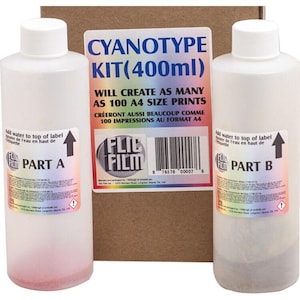 May include: A cyanotype kit with two white plastic bottles labeled 'Part A' and 'Part B', and a cardboard box. The kit includes instructions to create up to 100 A4 size prints. The bottles contain 400ml of liquid.