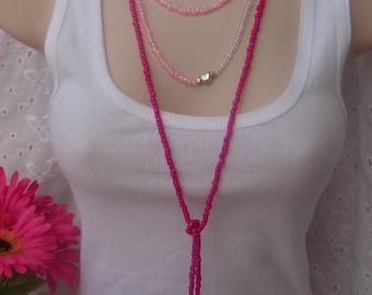 Breast Cancer Awareness Lariat in pink, white and fuchsia.