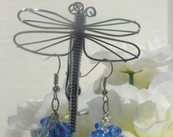 Swarovski crystals in Sapphire, Light Sapphire and Aquamarine clustered together in a blast of color.
