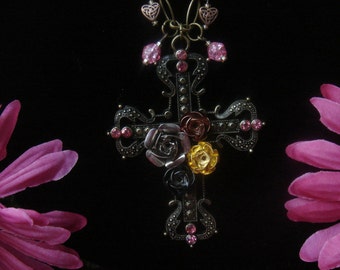 Victorian style necklace with cross pendant and matching earrings.