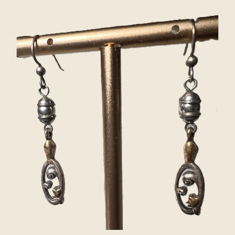 Conjunto de pulsera y pendientes con forma de corazón dorado en tono plateado de Brighton imagen 3