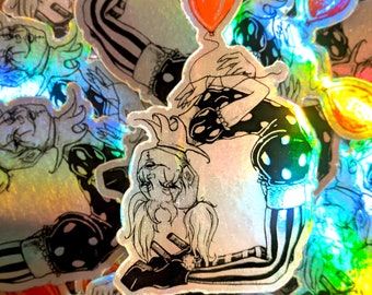 May include: Holographic stickers featuring a black and white illustration of a character with a clown-like appearance, holding an orange balloon. The character is wearing a striped outfit and a hat. The stickers have a reflective, iridescent finish.