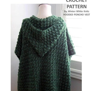 May include: A green crocheted hooded poncho vest. The vest is made with a textured stitch and has a large hood.