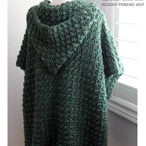 May include: A green hooded poncho vest crochet pattern. The pattern is for a hooded poncho vest with a textured stitch.