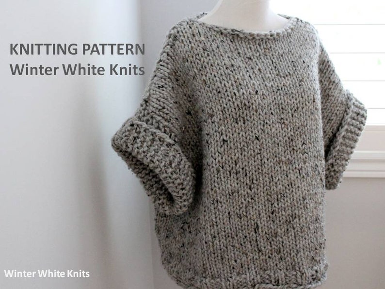 May include: Knitting pattern for a gray and white speckled sweater with a wide, loose fit and three-quarter sleeves. The pattern is called "Winter White Knits".