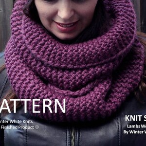 May include: A chunky, deep purple knit infinity scarf with a thick, textured stitch pattern. The image includes the text: PATTERN By Winter White Knits Not a Finished Product, and KNIT SCARF Lambs Wool Blend By Winter White Knits.