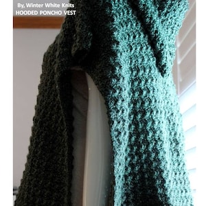May include: A crochet hooded poncho vest pattern in a dark green color. The pattern is called "Hooded Poncho Vest" and is by "Winter White Knits".