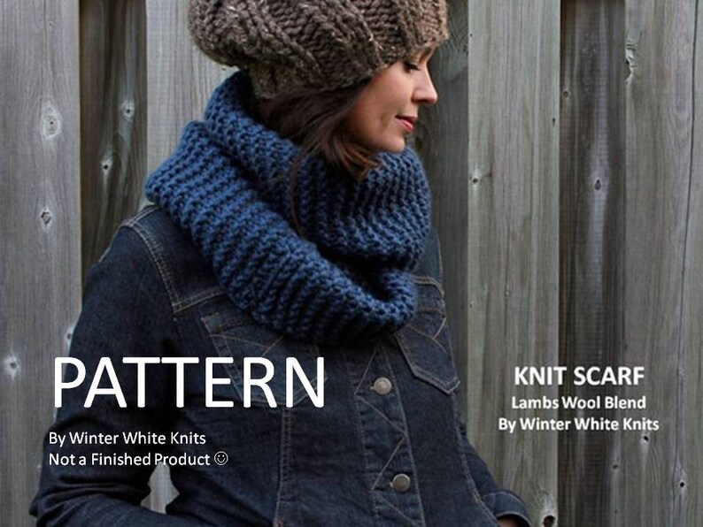 May include: A chunky blue knit infinity scarf worn with a brown knit beanie and a dark denim jacket. The image includes the text: PATTERN, KNIT SCARF, Lambs Wool Blend, By Winter White Knits, Not a Finished Product.